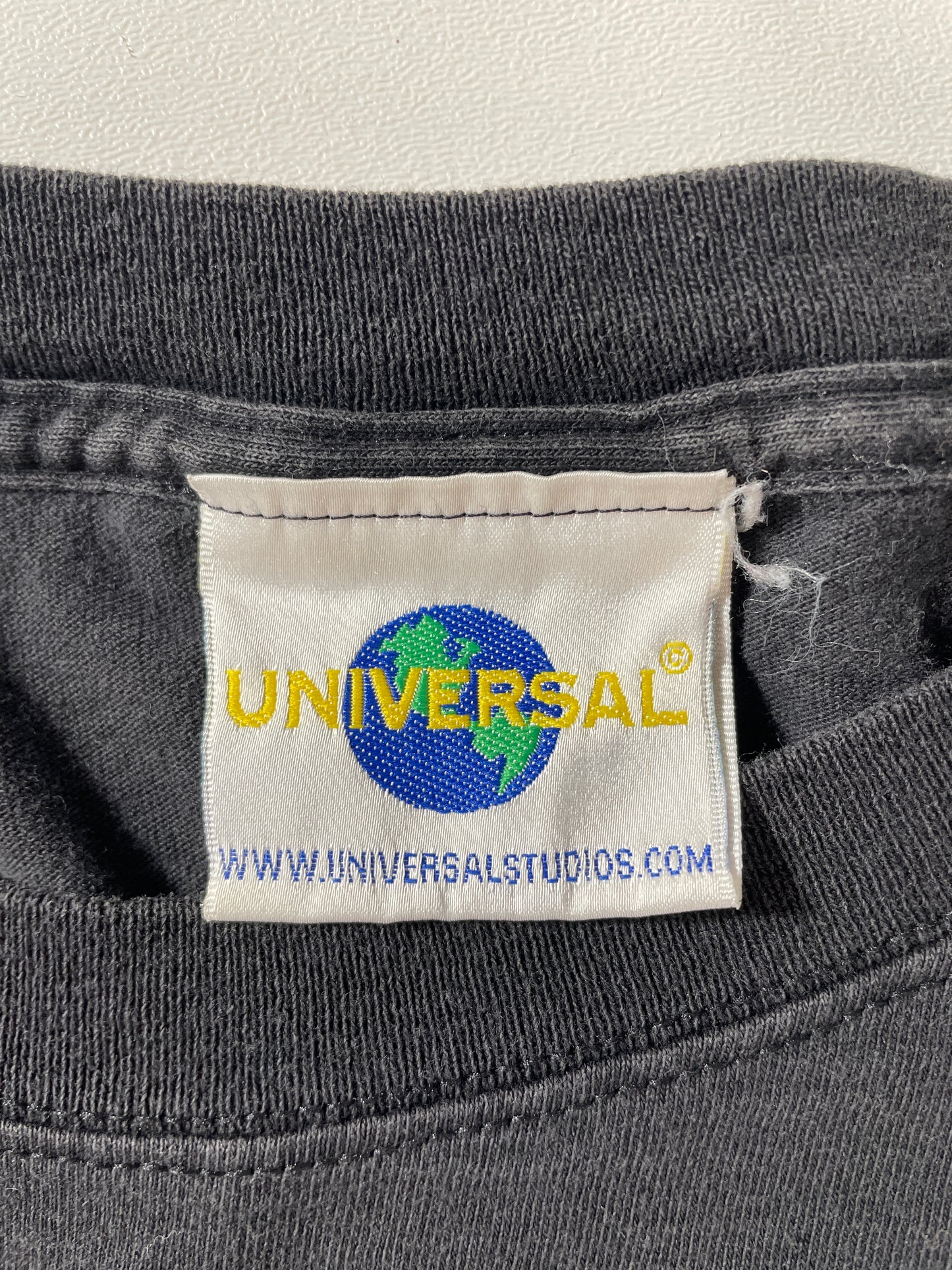 Vintage MEN IN BLACK UNIVERSAL STUDIO FLORIDA Size No Tag Approx. XL T-Shirt / F2985T