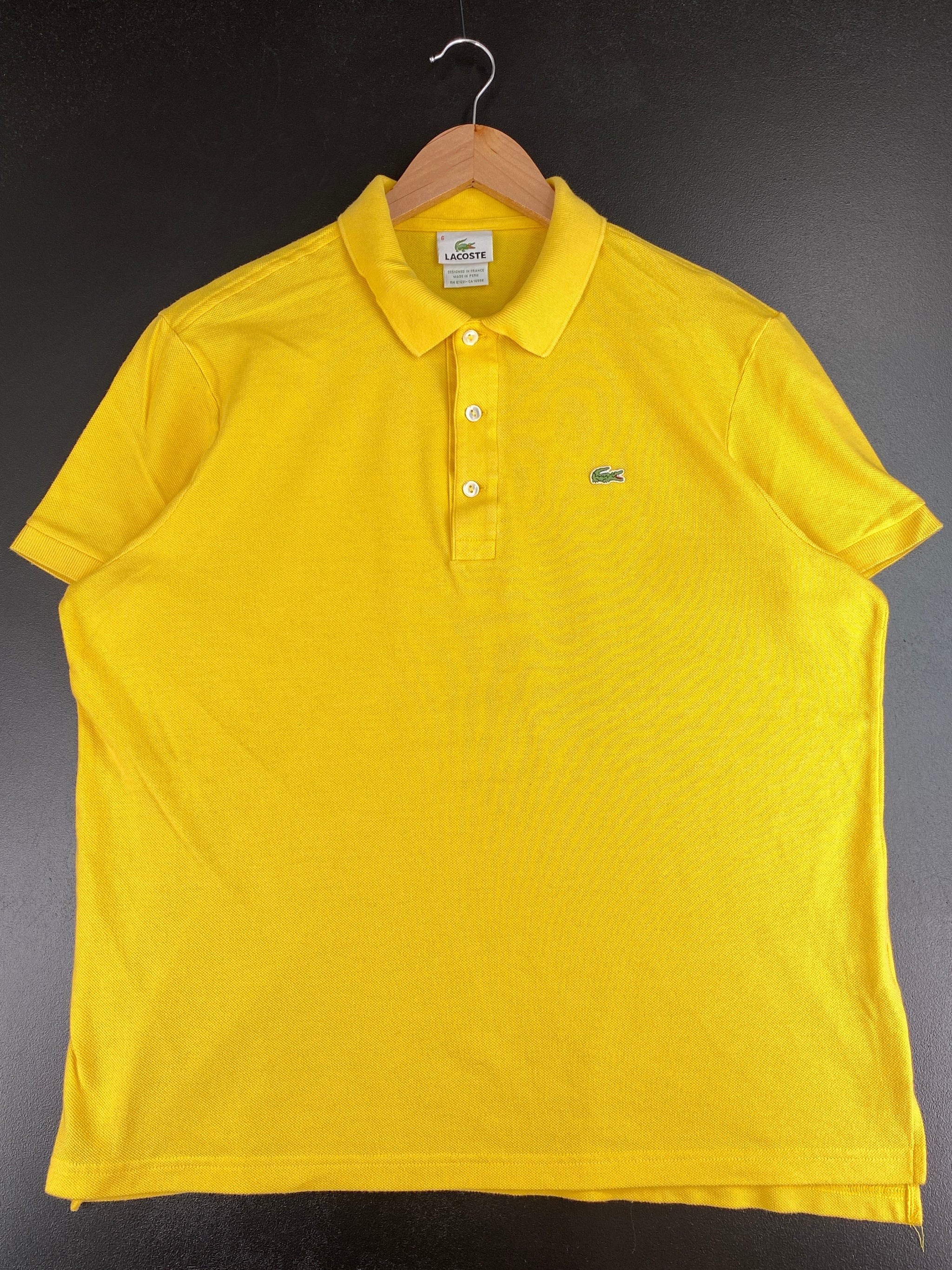 Mustard lacoste polo hotsell